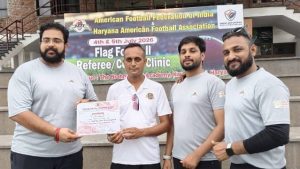 शारीरिक शिक्षक धर्मेंद्र चौधरी ने अमेरिकन फुटबॉल फेडरेशन ऑफ इंडिया (AFFI) और हरियाणा अमेरिकन फुटबॉल एसोसिएशन द्वारा आयोजित फ्लैग फुटबॉल रेफरी/कोच L-1 सर्टिफिकेशन क्लिनिक सफलतापूर्वक पूरा कर प्रदेश के पहले L-1 प्रमाणित रेफरी एवं कोच बनने का गौरव हासिल किया है।